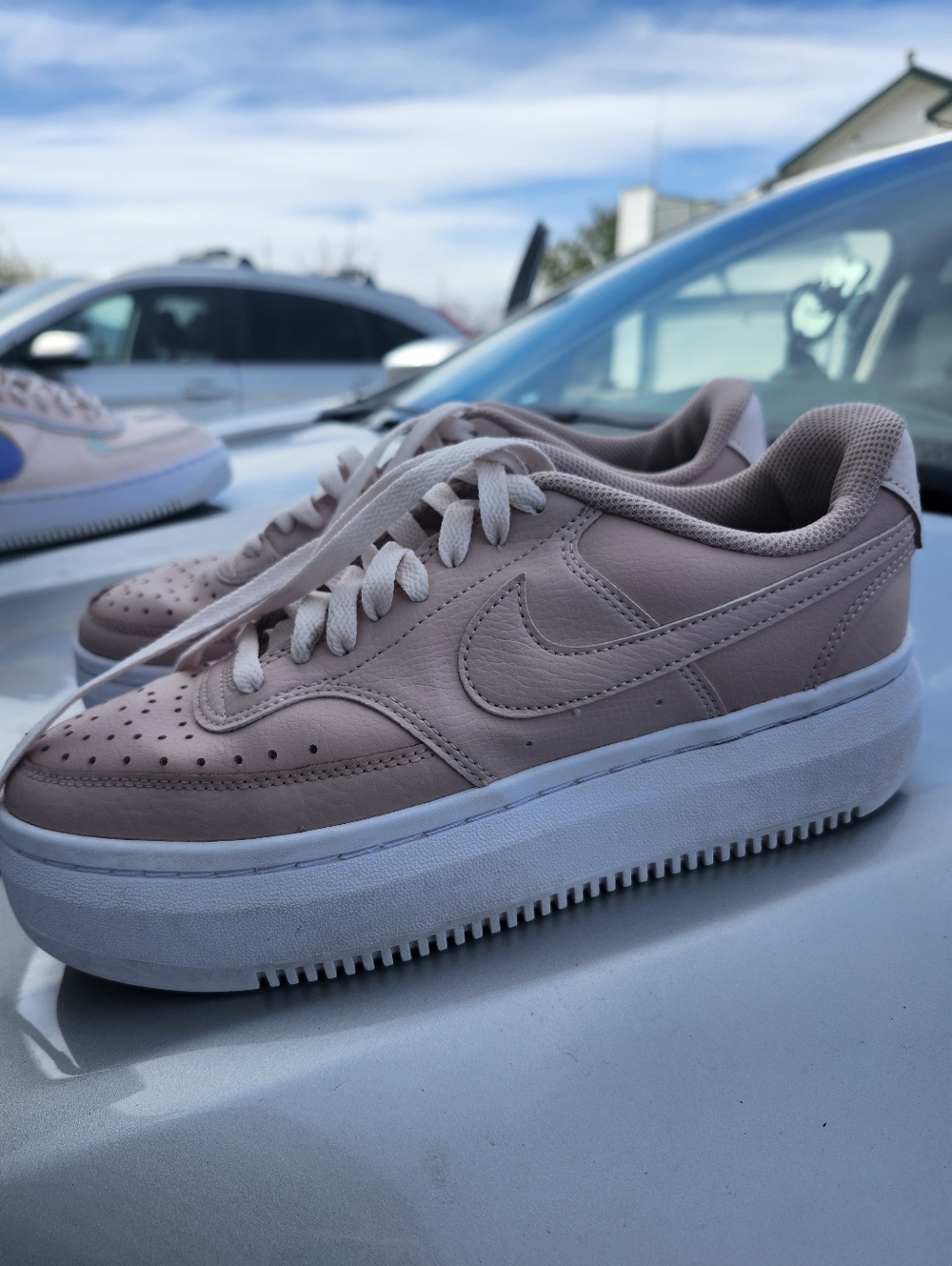 Nike Women’s Blush Pink Leather Platform Sneakers